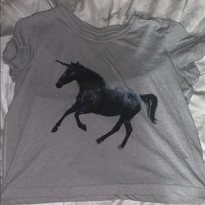 a belly shirt with unicorn on the front